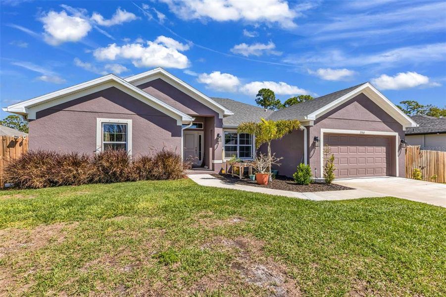 Front exterior of a new home in , Punta Gorda, FL, highlighting curb appeal (Image 22).