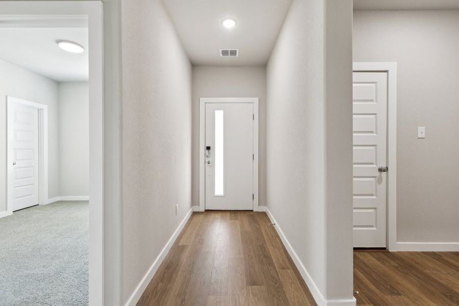 Entryway in the Emmy II home plan by Trophy Signature Homes - REPRESENTATIVE PHOTO Entryway in the Emmy II home plan by Trophy Signature Homes - REPRESENTATIVE PHOTO