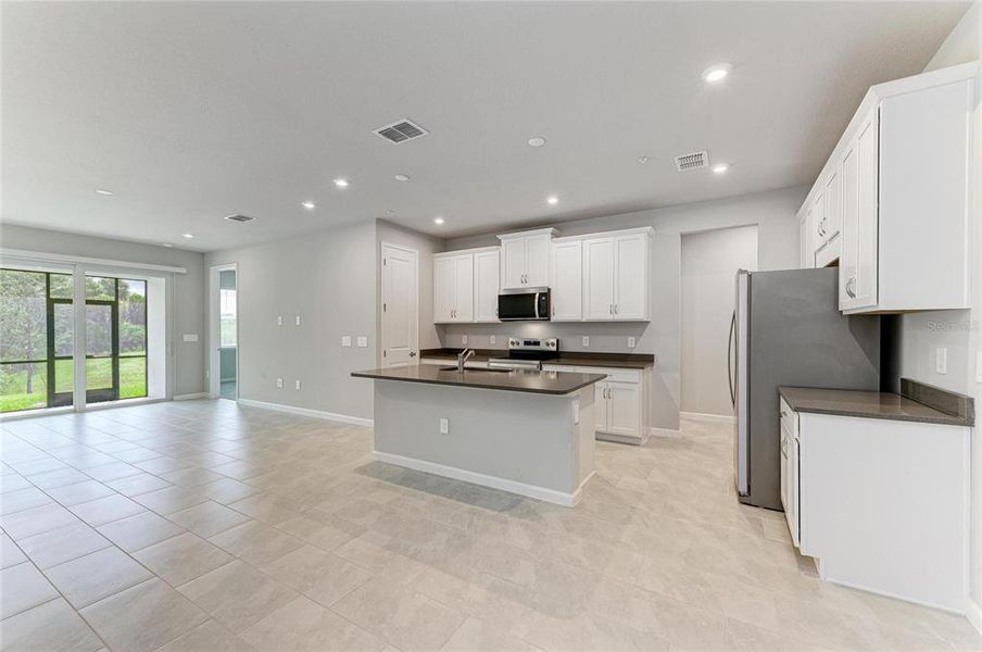 Furnished interior view inside a new home in Wellen Park, Venice (Image 9).