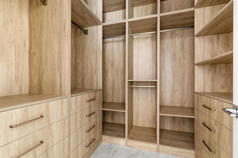 View of walk in closet View of walk in closet