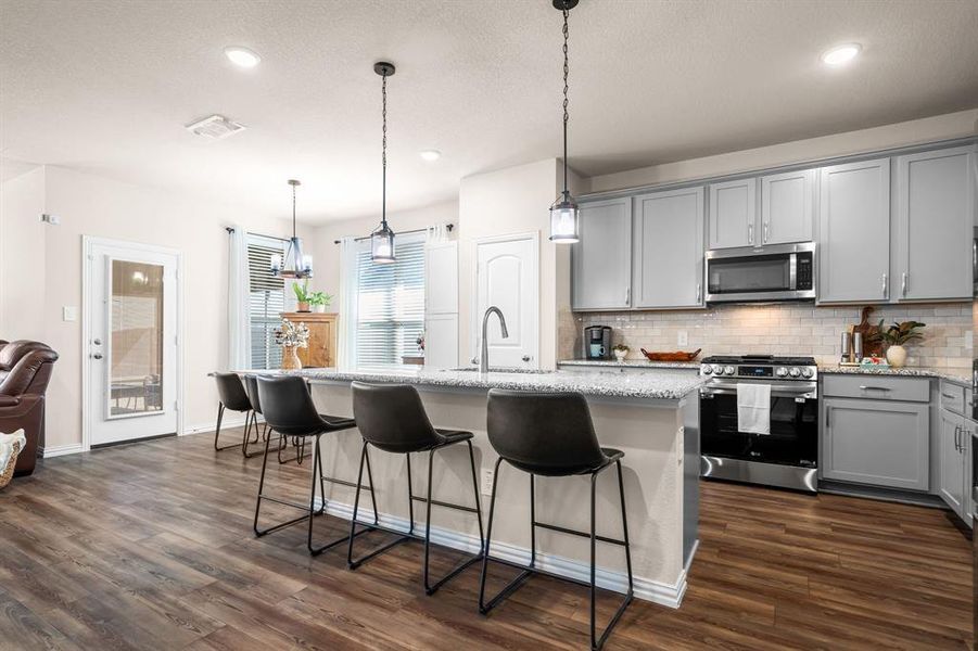 Oversized pantry and designer-look lighting!