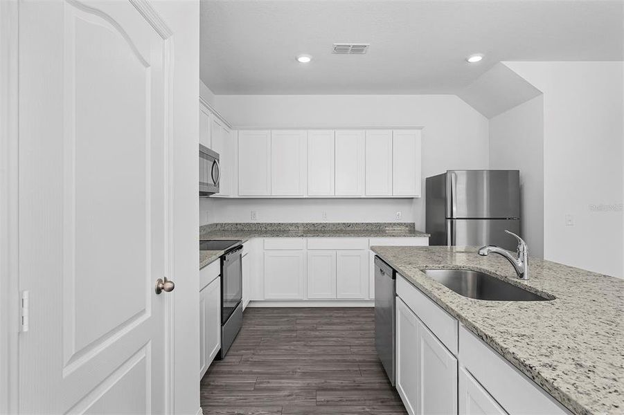 Furnished interior view inside a new home in , Poinciana (Image 5).