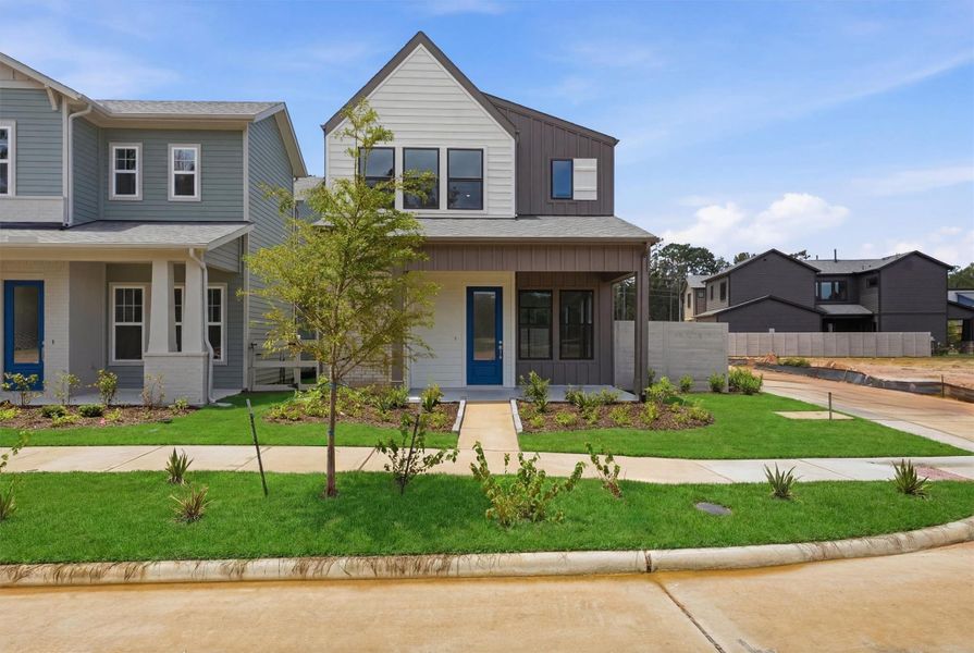 Front exterior of a new home in Two Step Farm, Montgomery, TX, highlighting curb appeal (Image 1). Front exterior of a new home in Two Step Farm, Montgomery, TX, highlighting curb appeal (Image 1).