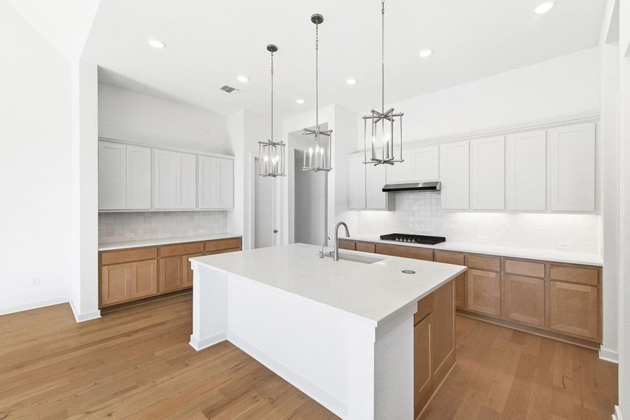 Furnished interior view inside a new home in 6 Creeks at Waterridge, Kyle (Image 5).