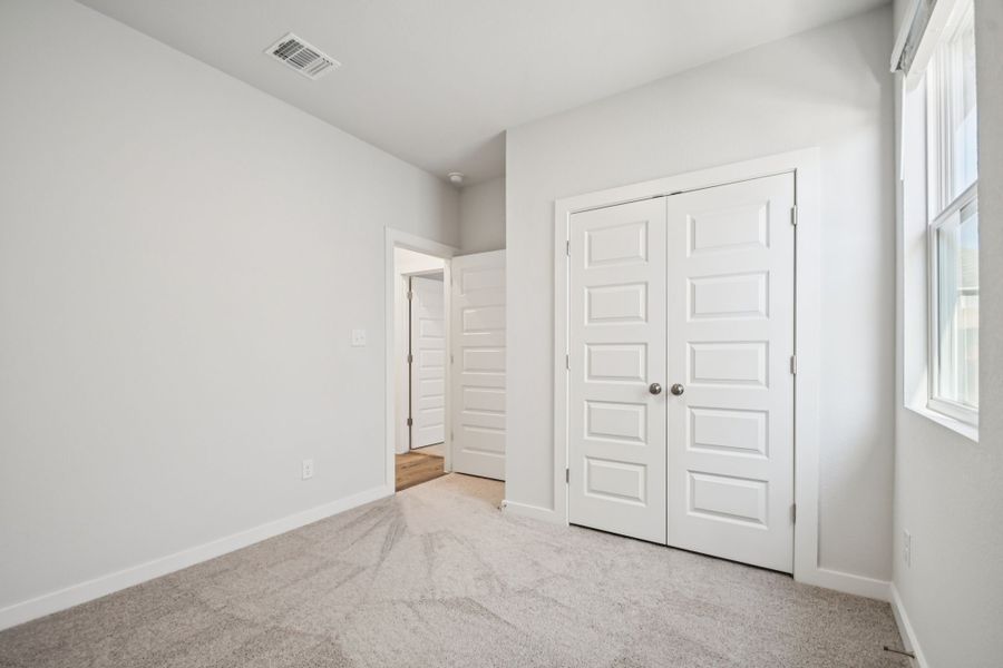 A room with white doors.