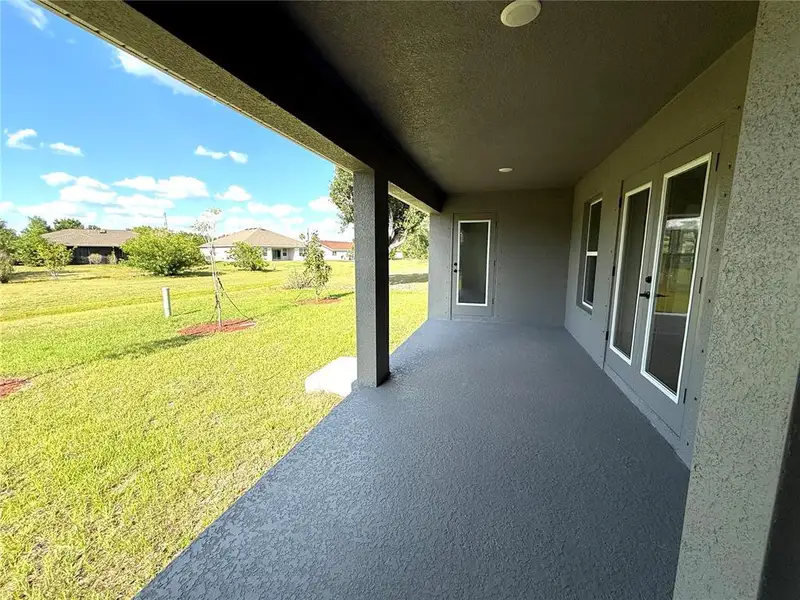 Exterior details and patio area of a home in Deep Creek, Punta Gorda (Image 15).