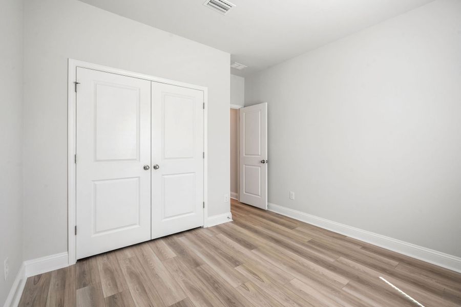 Spacious, unfurnished interior of a new home in Waterways, Richmond Hill (Image 49).