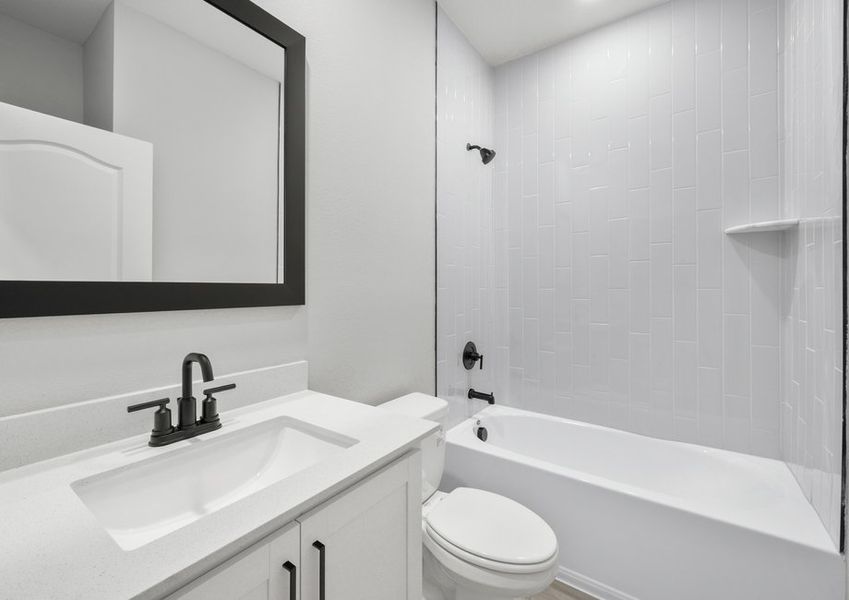 The secondary bathroom comes with a beautifully tiled shower The secondary bathroom comes with a beautifully tiled shower