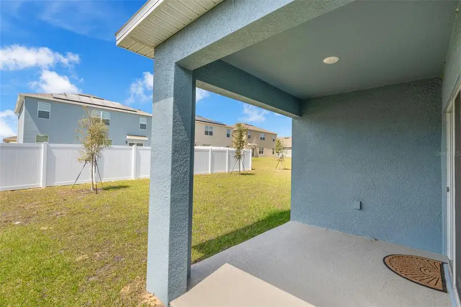 Exterior details and patio area of a home in Cypress Park Estates, Haines City (Image 3).