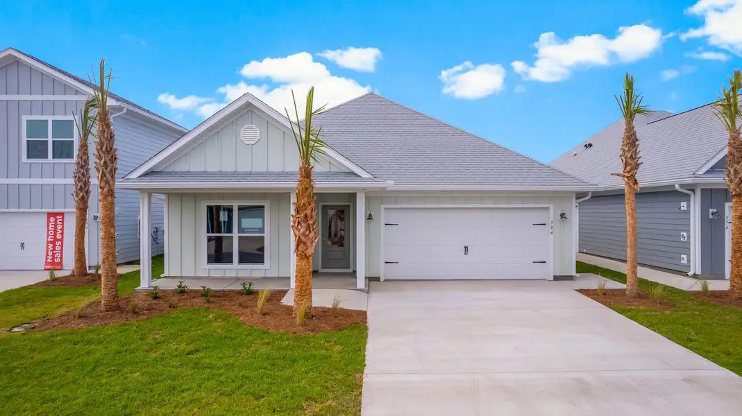 Front exterior of a new home in WindMark Beach, Port Saint Joe, FL, highlighting curb appeal (Image 1). Front exterior of a new home in WindMark Beach, Port Saint Joe, FL, highlighting curb appeal (Image 1).