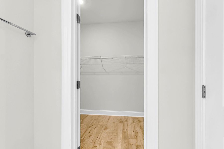 Spacious, unfurnished interior of a new home in Tidewater at Lakes of Cane Bay, Summerville (Image 37).