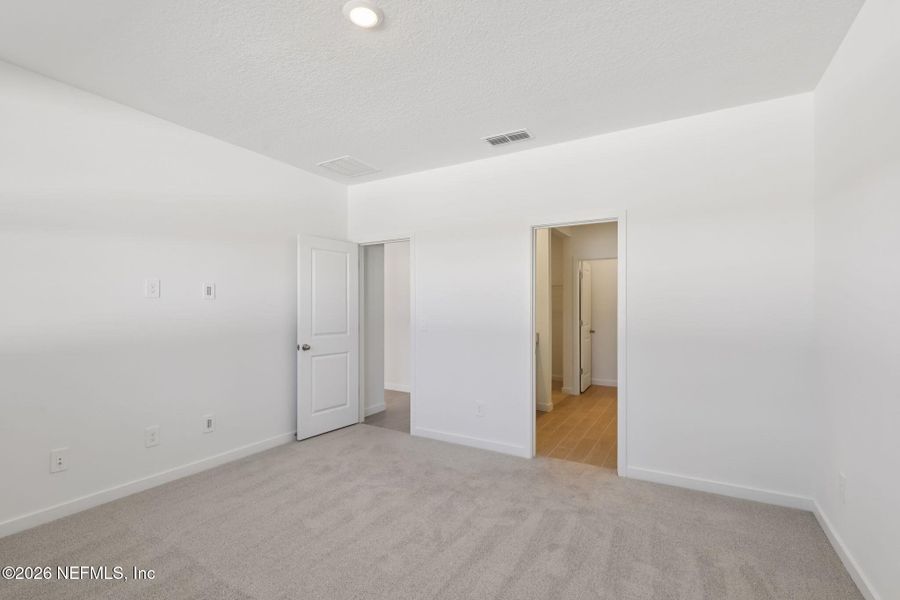 Spacious, unfurnished interior of a new home in Flagler Village - Signature Series, Palm Coast (Image 18).