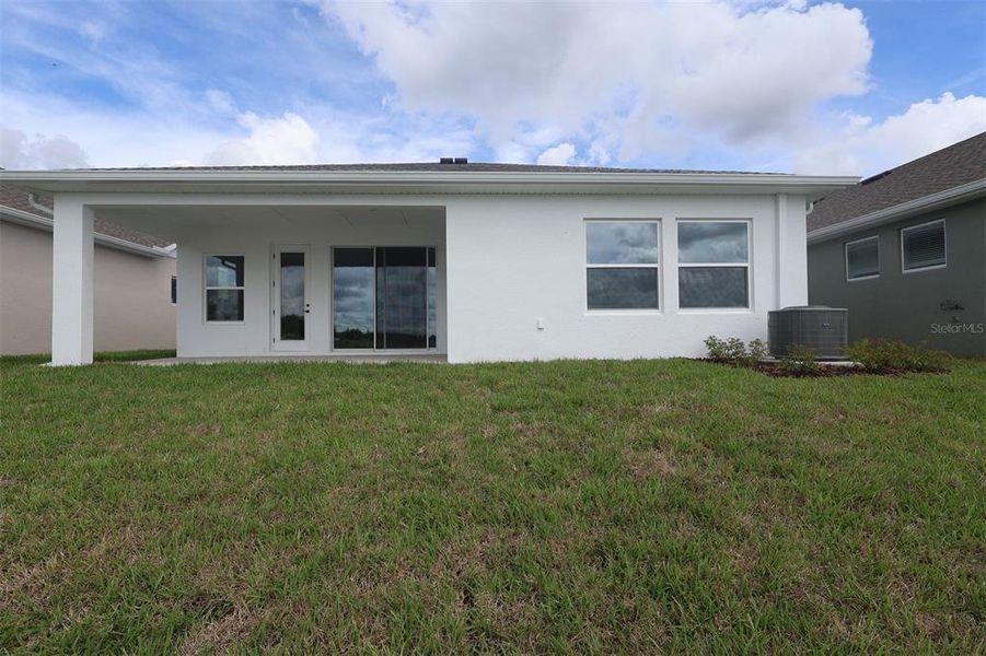 Exterior details and patio area of a home in The Peninsula at Rhodine Lake, Riverview (Image 2). Exterior details and patio area of a home in The Peninsula at Rhodine Lake, Riverview (Image 2).