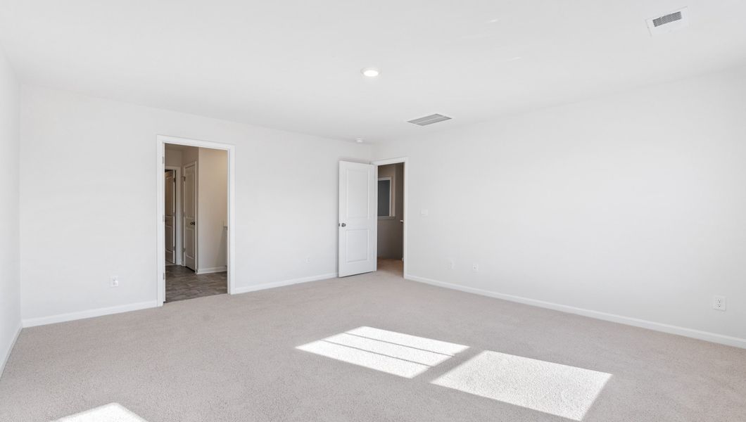 Representative unfurnished interior of a home built from the PENWELL by D.R. Horton in Cascade Point, Seneca (Image 27).