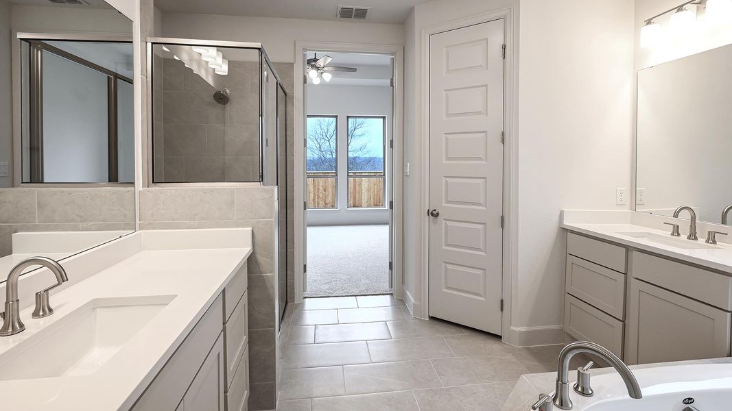 Furnished interior view inside a new home in Crosswinds 50', Kyle (Image 9).