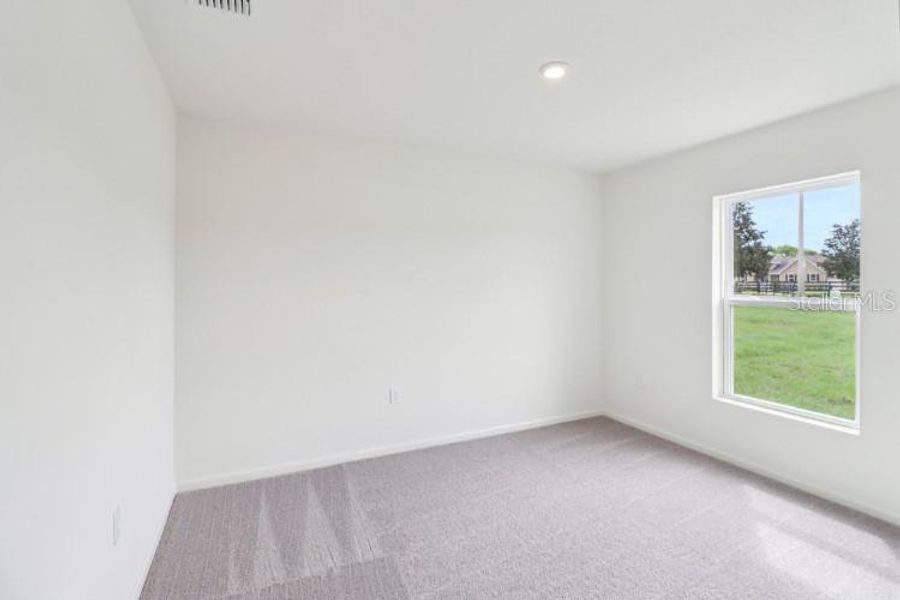 Spacious, unfurnished interior of a new home in Palm Bay Classic, Palm Bay (Image 13).