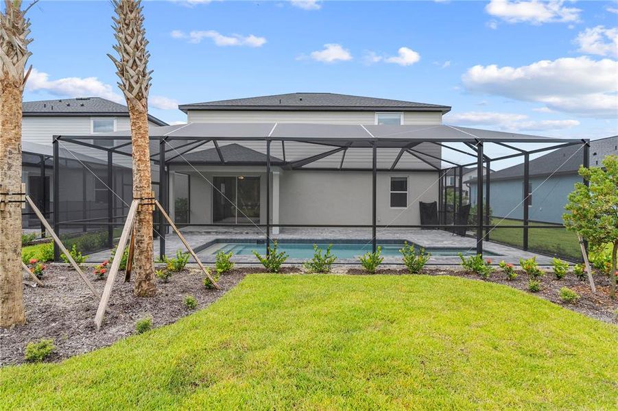 Exterior details and patio area of a home in Sabal Glen at Babcock Ranch, Punta Gorda (Image 3). Exterior details and patio area of a home in Sabal Glen at Babcock Ranch, Punta Gorda (Image 3).