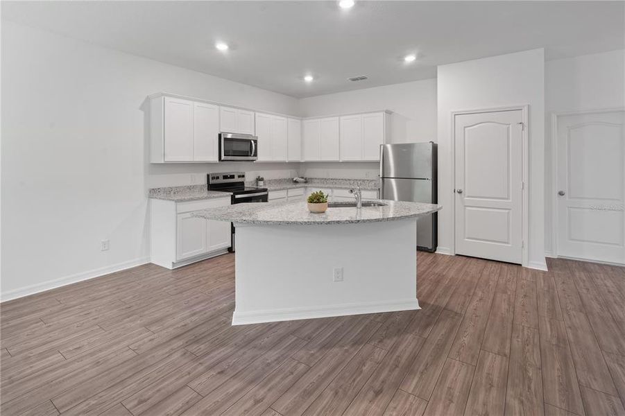 Furnished interior view inside a new home in , Kissimmee (Image 4).