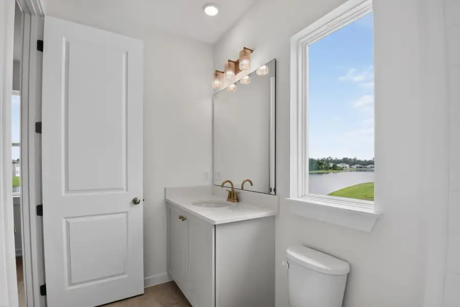 Furnished interior view inside a new home in Ardisia Park, New Smyrna Beach (Image 11).