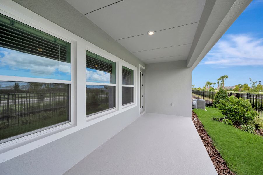 Exterior details and patio area of a home in Waterset Bungalow Series, Apollo Beach (Image 3).