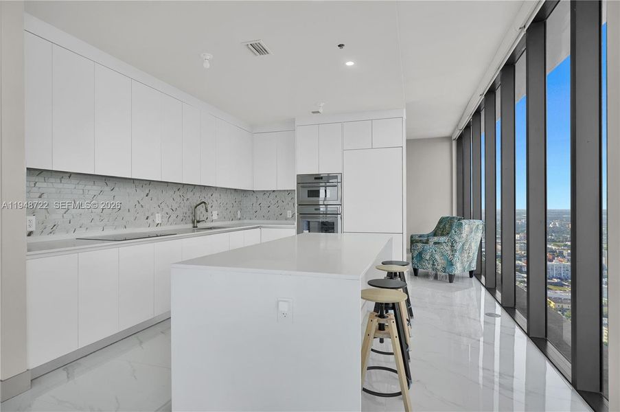 Furnished interior view inside a new home in , Miami (Image 10).