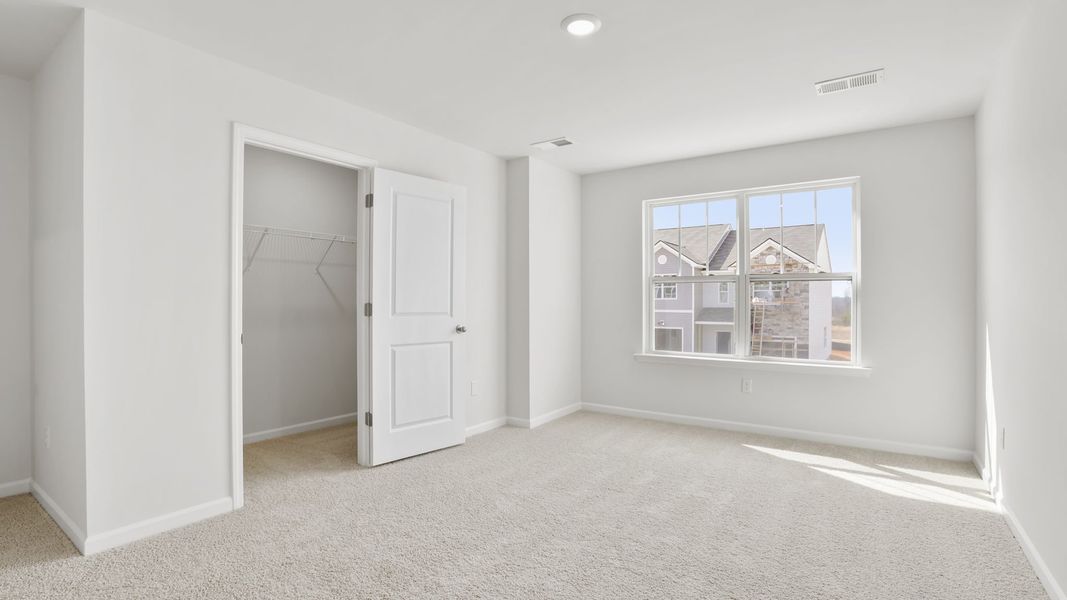 Spacious, unfurnished interior of a new home in Chestnut Ridge Townhomes, Greenville (Image 22).