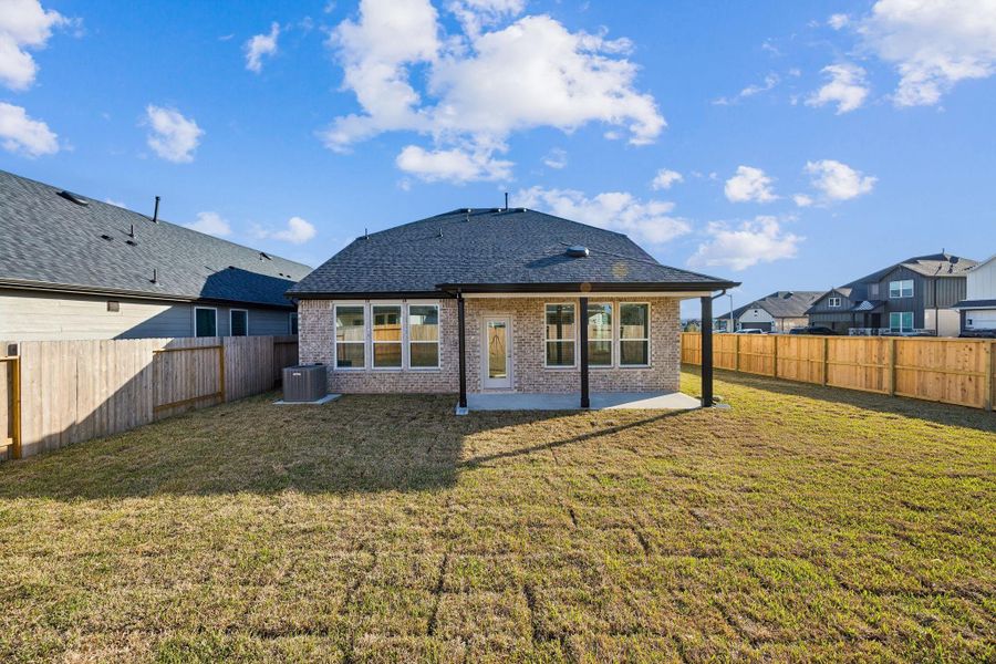 Exterior details and patio area of a home in Montgomery Bend, Montgomery (Image 3).