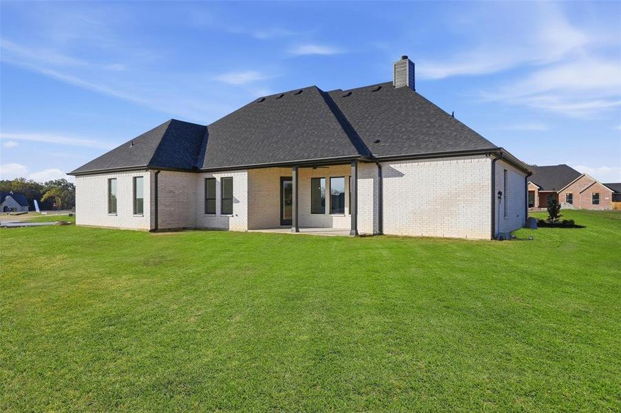 Exterior details and patio area of a home in , Azle (Image 27).