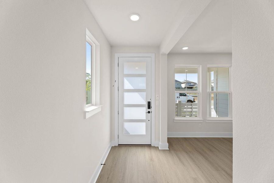Spacious, unfurnished interior of a new home in Cottage Collection at Harvest, Argyle (Image 12).