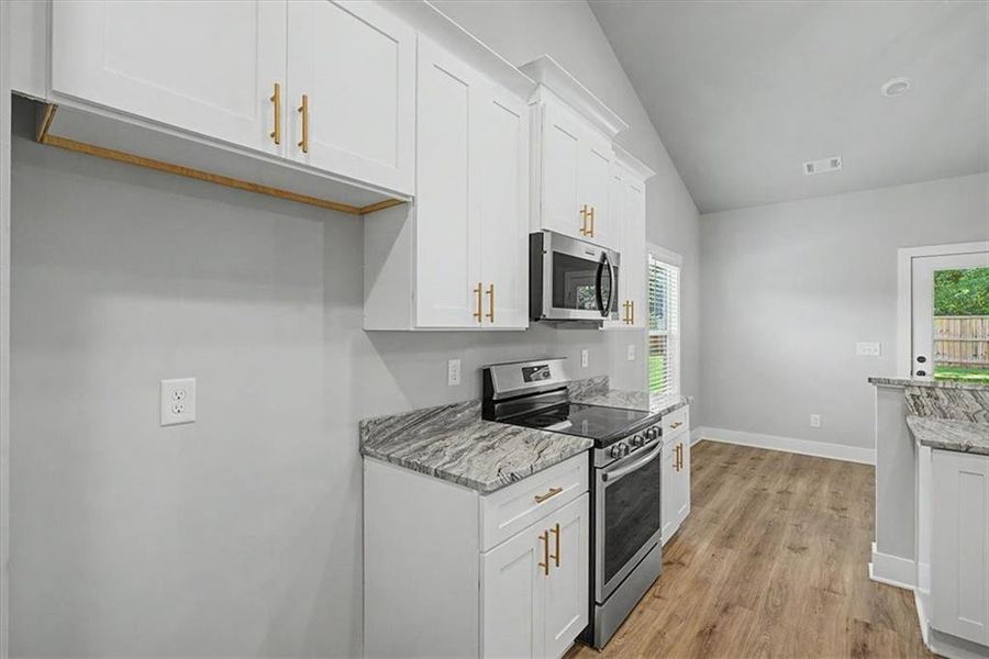 Furnished interior view inside a new home in , Dallas (Image 11).