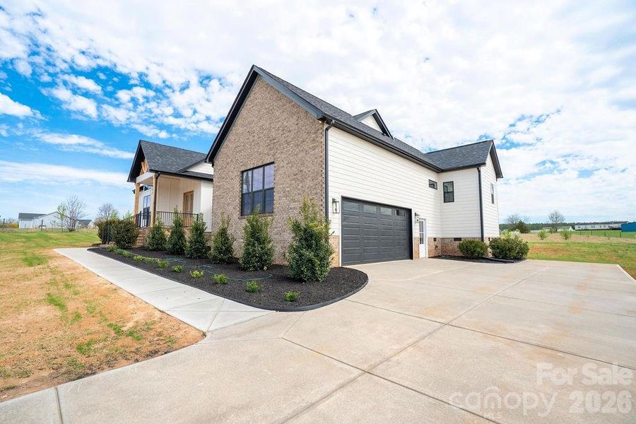Front exterior of a new home in , Lincolnton, NC, highlighting curb appeal (Image 2). Front exterior of a new home in , Lincolnton, NC, highlighting curb appeal (Image 2).
