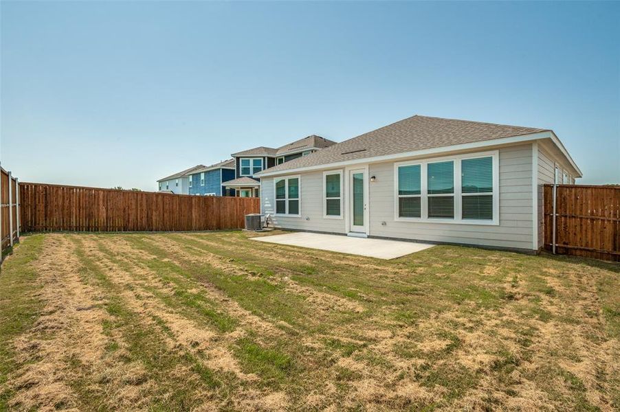 Front exterior of a new home in Cottonwood Creek, Seagoville, TX, highlighting curb appeal (Image 2). Front exterior of a new home in Cottonwood Creek, Seagoville, TX, highlighting curb appeal (Image 2).
