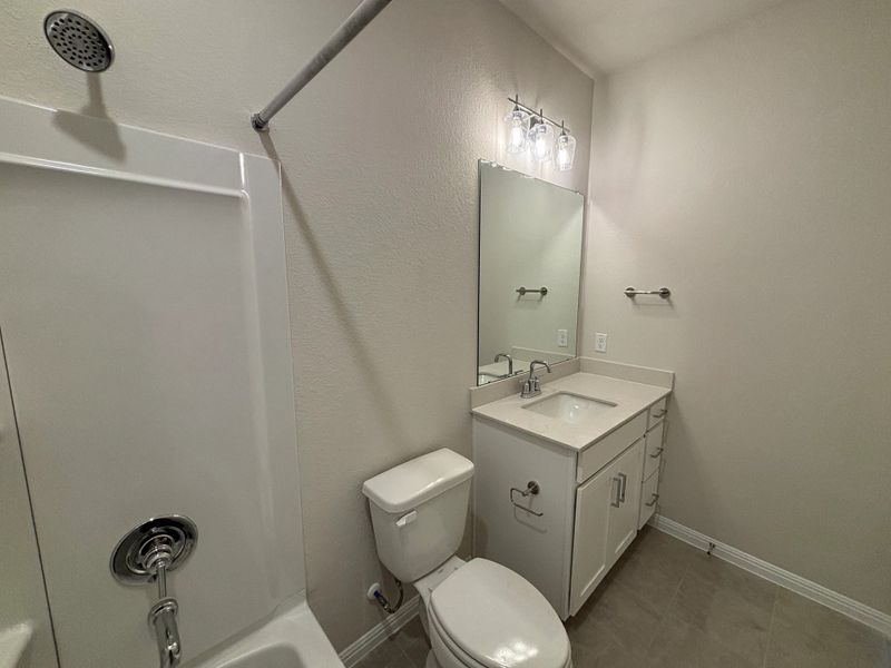 Furnished interior view inside a new home in Cannon Ranch 40s, Dripping Springs (Image 14).