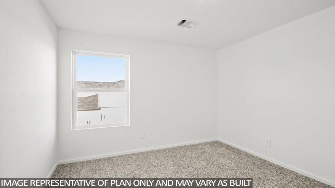Empty room featuring light colored carpet and baseboards Empty room featuring light colored carpet and baseboards