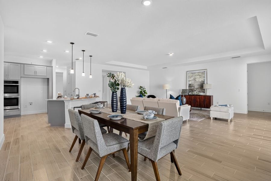 Representative furnished interior of a home built from the Abaco by Taylor Morrison in Ardisia Park, New Smyrna Beach (Image 13).