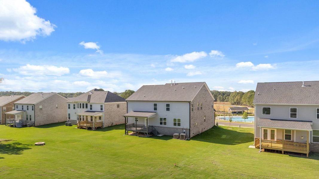Front exterior of a new home in Heritage Pointe, Senoia, GA, highlighting curb appeal (Image 35). Front exterior of a new home in Heritage Pointe, Senoia, GA, highlighting curb appeal (Image 35).