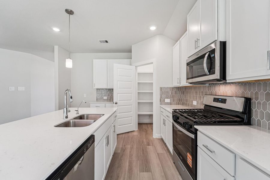 Furnished interior view inside a new home in Massey Oaks - Premier Series, Pearland (Image 13).