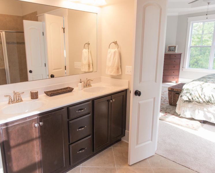 Representative furnished interior of a home built from the Ansley by Bill Clark Homes in The Sanctuary at Sunset Beach, Sunset Beach (Image 33).