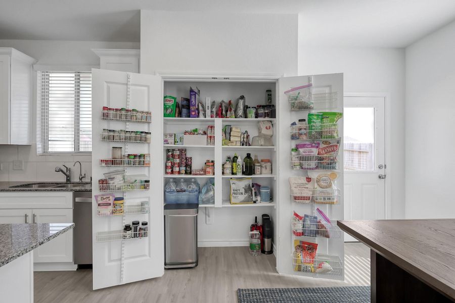 Furnished interior view inside a new home in Mavera, Conroe (Image 30).