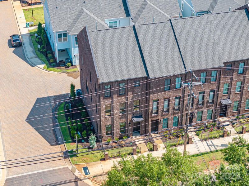 Front exterior of a new home in , Huntersville, NC, highlighting curb appeal (Image 23).