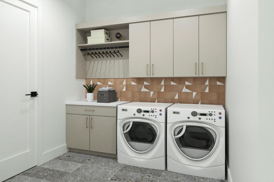 Washroom with cabinets and independent washer and dryer