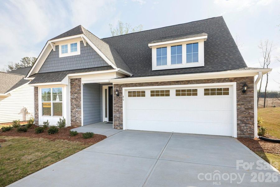 Front exterior of a new home in , Mill Spring, NC, highlighting curb appeal (Image 2). Front exterior of a new home in , Mill Spring, NC, highlighting curb appeal (Image 2).