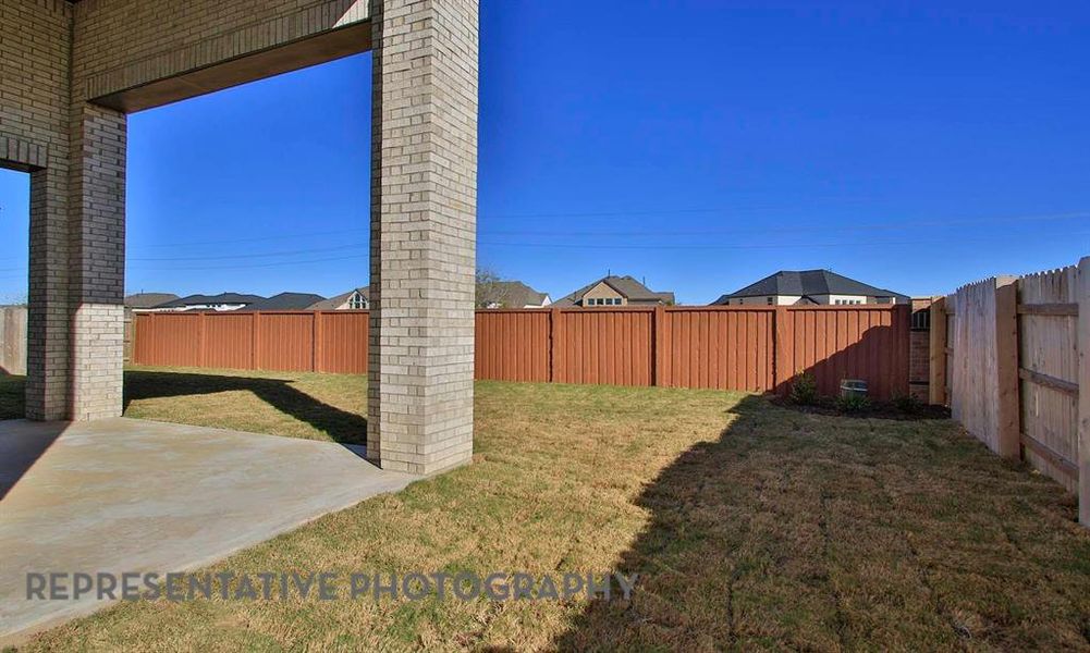 Exterior details and patio area of a home in Star Trail, Prosper (Image 24).