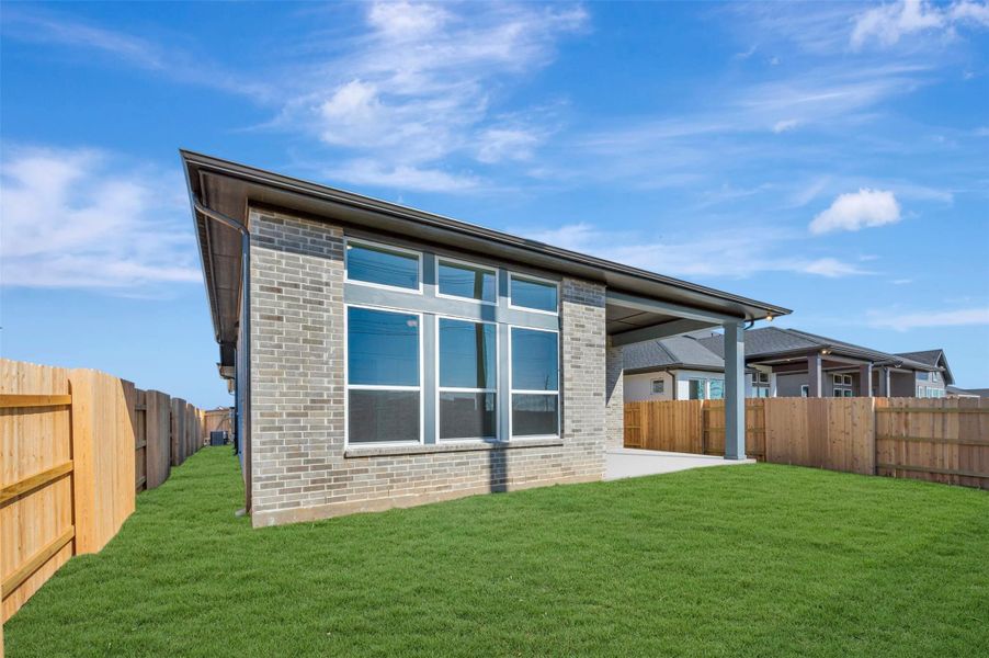 Exterior details and patio area of a home in Elyson - Reserve Collection, Katy (Image 4).
