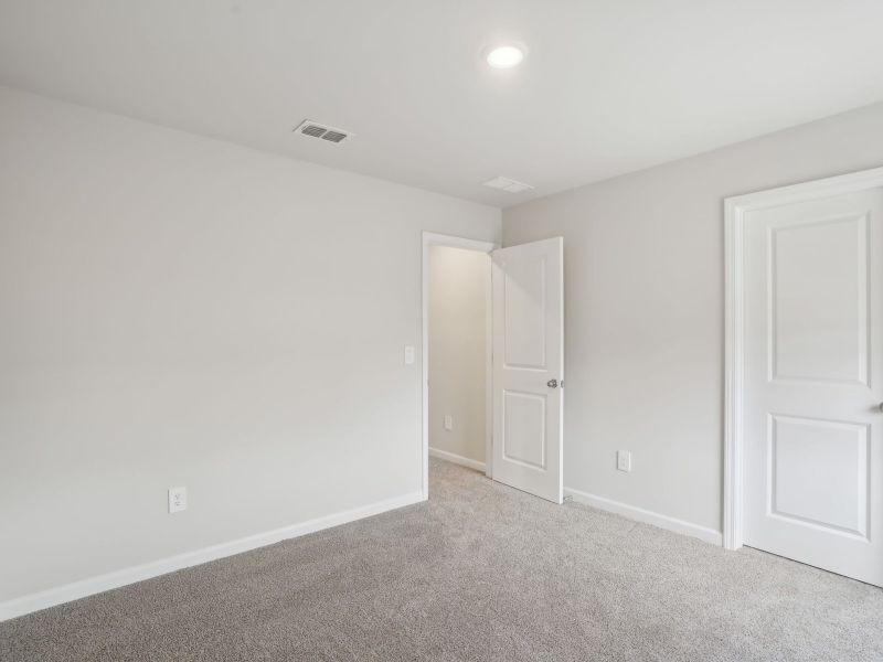 Spacious, unfurnished interior of a new home in Martin Springs - Cottage Series, Lawrenceville (Image 20).
