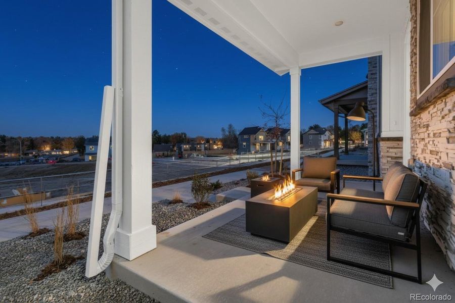 virtually staged. Front patio overlooking park virtually staged. Front patio overlooking park