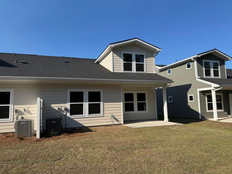 Exterior details and patio area of a home in , Ravenel (Image 21).