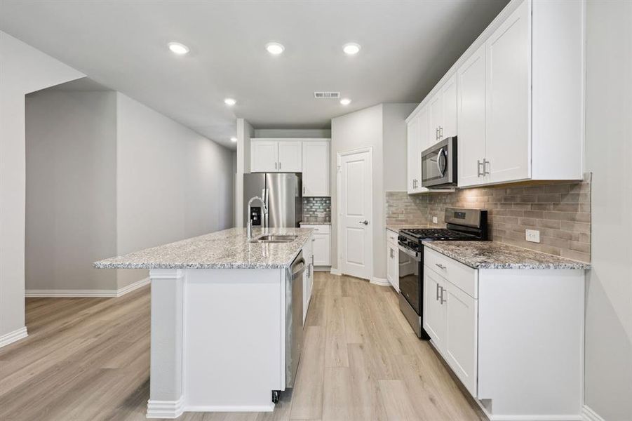 Furnished interior view inside a new home in Westmoor, Sherman (Image 14).