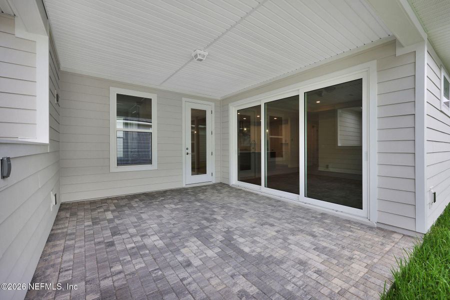 Exterior details and patio area of a home in Seabrook Village at Seabrook, Nocatee (Image 28).