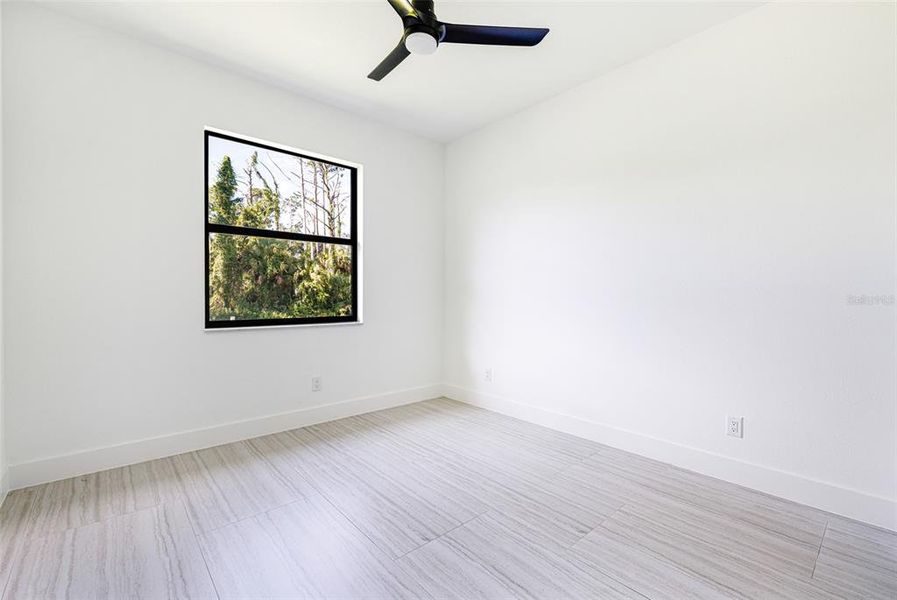 Spacious, unfurnished interior of a new home in , Port Charlotte (Image 16).
